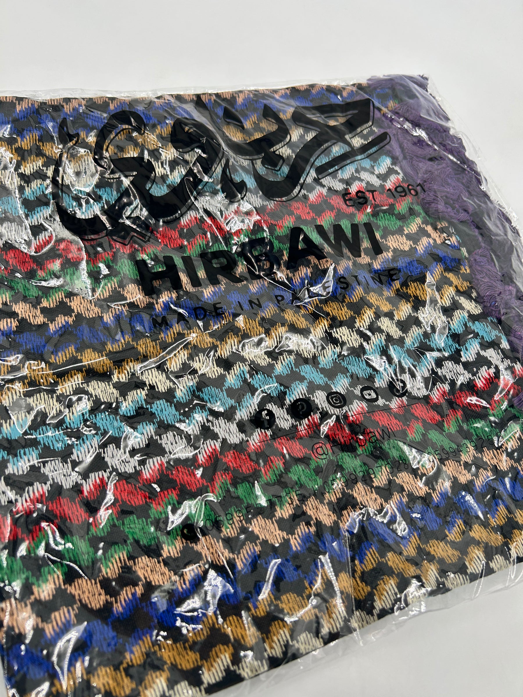 Authentieke Hirbawi kuffiyeh - veelkleurig met paarse kwast